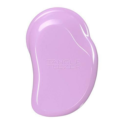 タングルティーザー　TANGLE　TEEZER　オルジナル　スウィートライラックは、柄のないブラシ自体を握りこむ形状、頭皮に沿うようにラウンドした長短のブラシの配合などは、すべて人間工学に基づき計算して生まれた、髪を健やかに保つために考え抜かれたデザインです。（パッケージ写真）